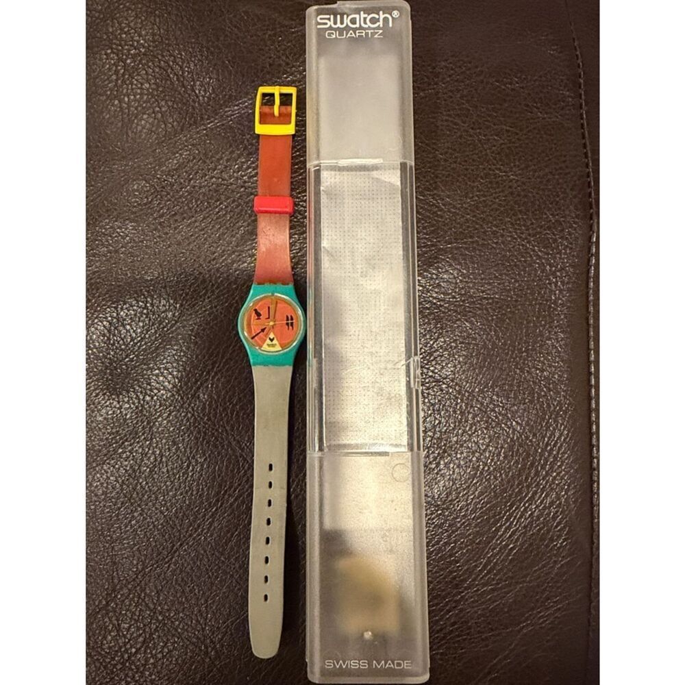 Vintage 1986 Swatch Lady HORUS LL101 Watch – Teal Case, Orange Hieroglyph Dial